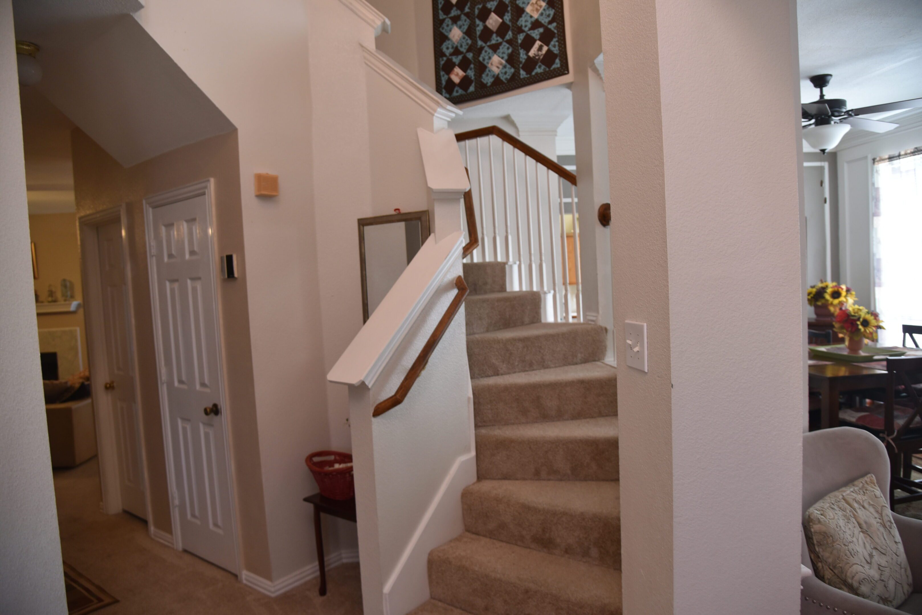 Carpeted staircase in a residential home.