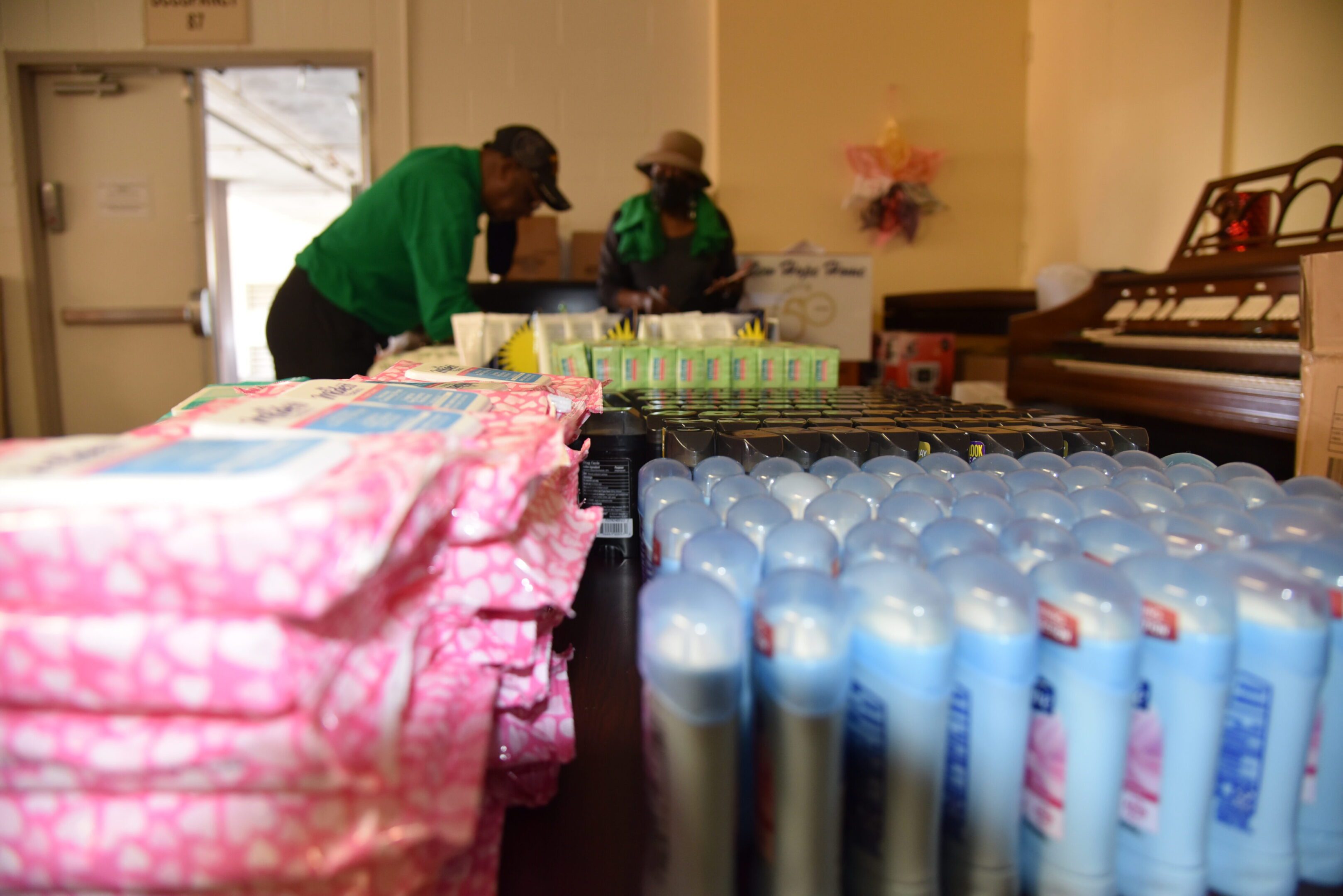 Stacks of hygiene products on a table.