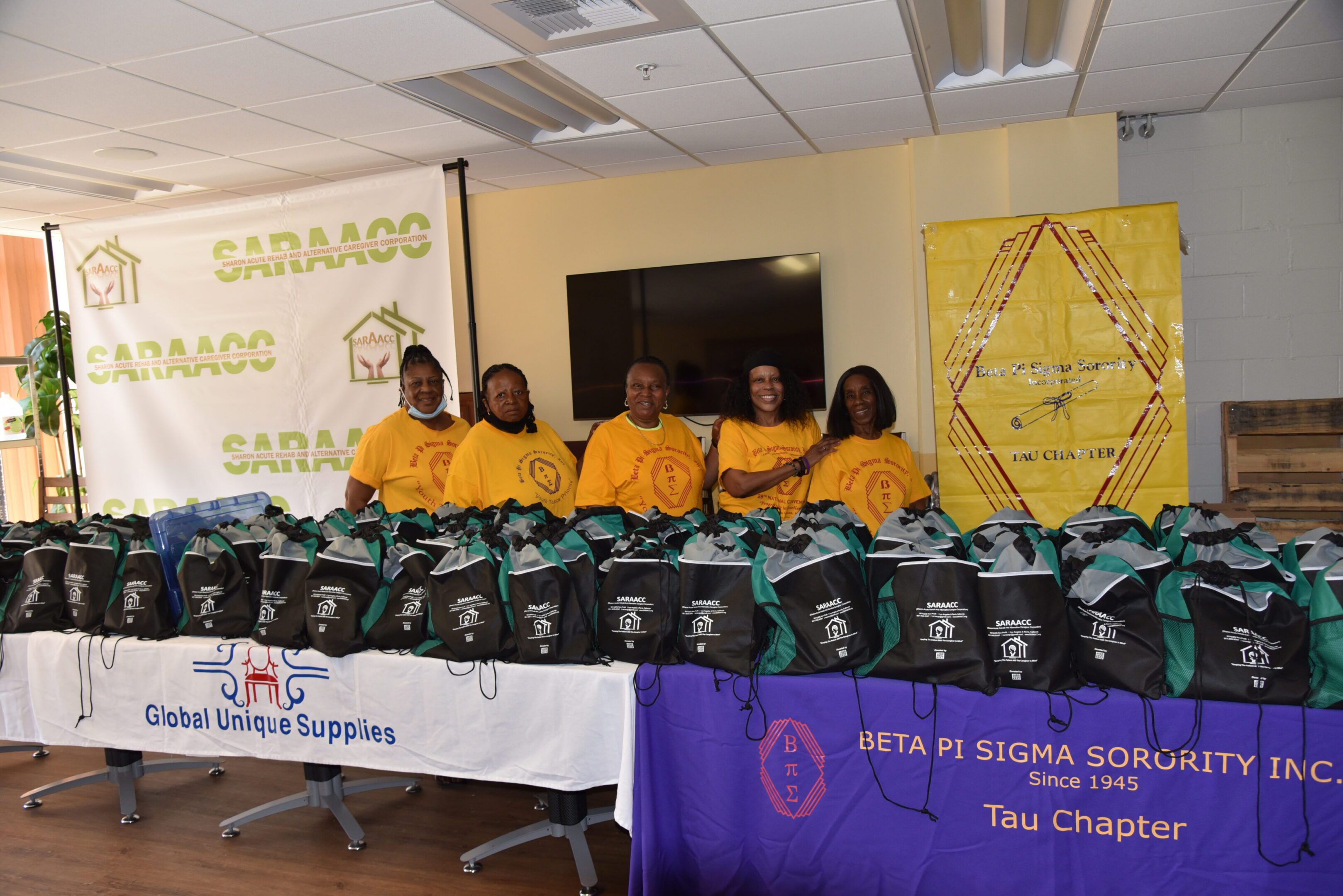 A group of women with backpacks displayed.