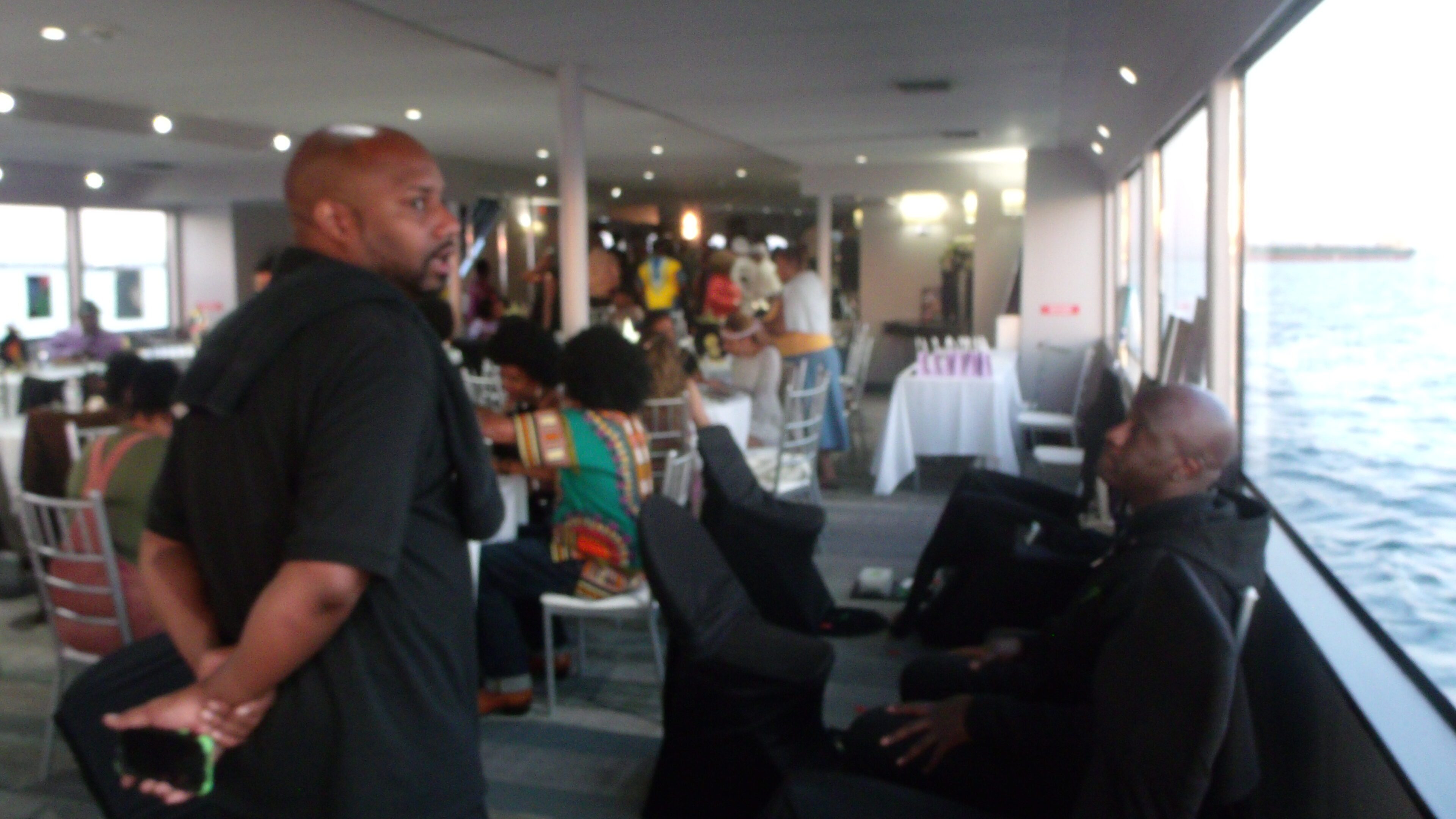 People socializing at an indoor event.
