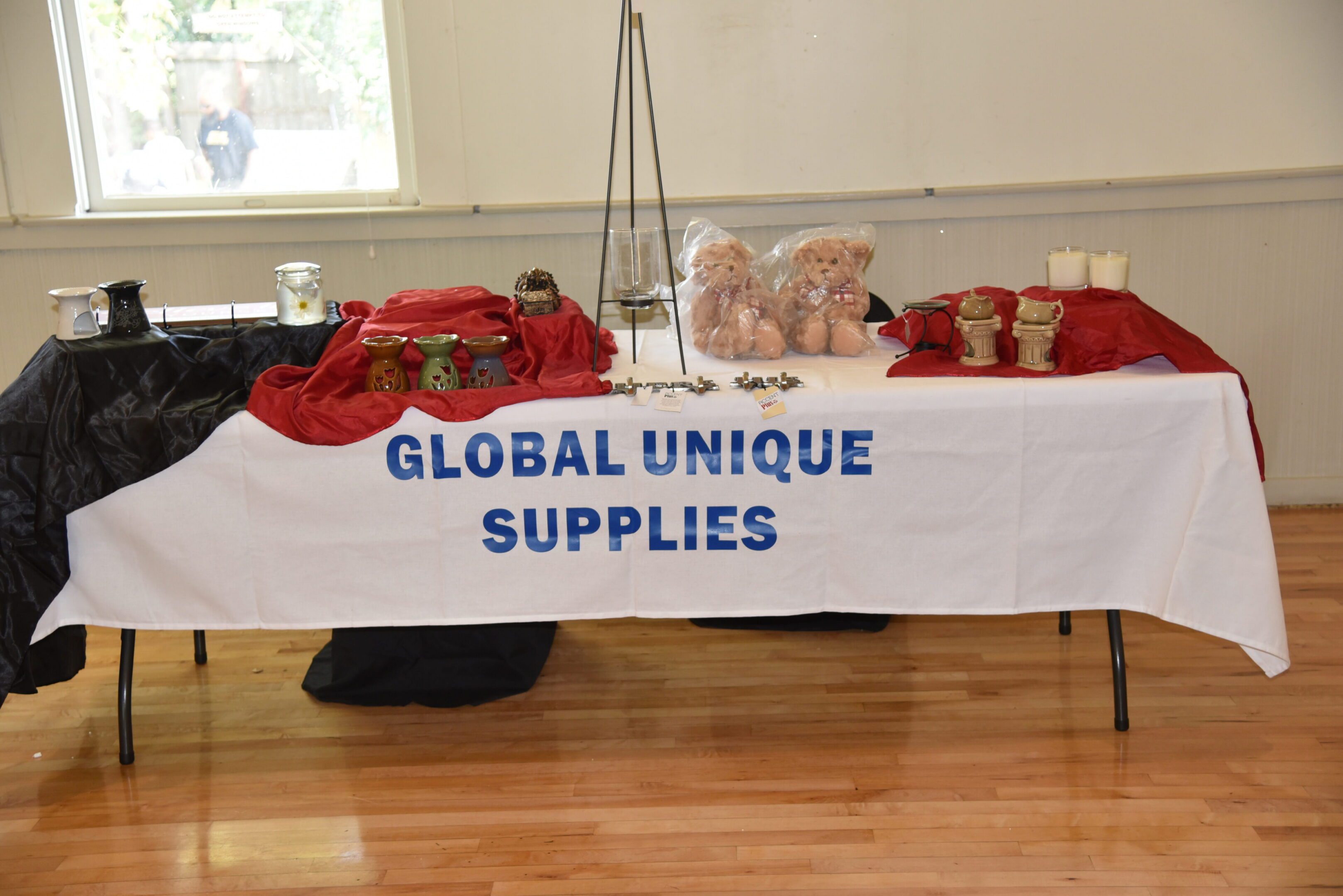 Table display with various supplies and products.