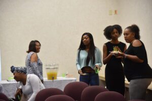 People socializing at a casual indoor gathering.
